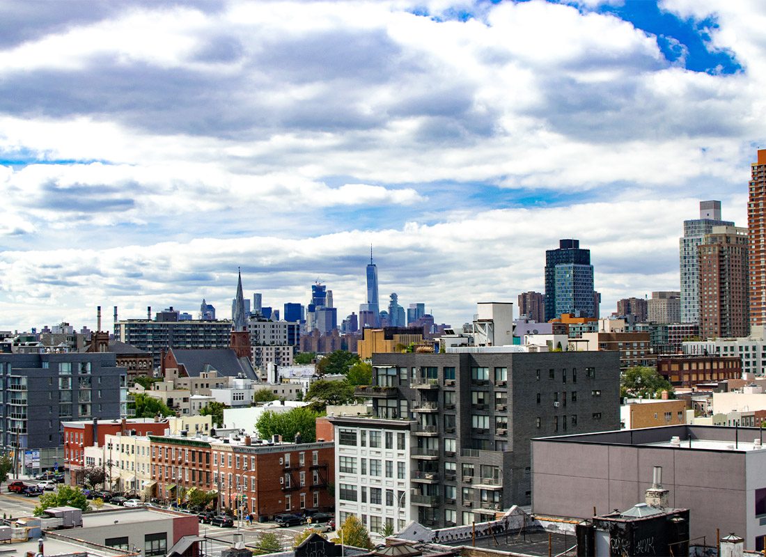 Queens, NY - View of North Queens With Lower Manhattan in the Background on a Cloudy Day